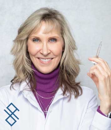 Dr. Susan Bushelman showing DAXXIFY syringe